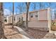 Exterior home with siding, sidewalk, trees, and a stone foundation at 6739 Valley Ct, Douglasville, GA 30135