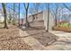 Charming home with siding, stone accents, driveway, and garage entrance at 6739 Valley Ct, Douglasville, GA 30135