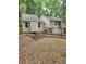 Charming home featuring a neutral palette, newer windows, and lush landscaping with a stone foundation at 6739 Valley Ct, Douglasville, GA 30135