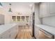 Bright kitchen with stainless steel appliances and white countertops at 6739 Valley Ct, Douglasville, GA 30135