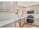 Well-equipped kitchen with modern appliances, sleek countertops, and ample cabinet space at 6739 Valley Ct, Douglasville, GA 30135