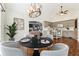 Eat-in kitchen dining area with modern cabinets and wood floors at 140 Double D Rd, Temple, GA 30179