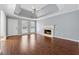Large living room featuring a fireplace and hardwood floors at 140 Double D Rd, Temple, GA 30179
