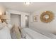 Bedroom with a closet and starburst mirror at 58 Leggett Dr # 186, Villa Rica, GA 30180