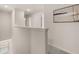 Bright hallway with half wall and neutral paint at 58 Leggett Dr # 186, Villa Rica, GA 30180