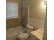 Neutral bathroom featuring a bathtub and tile surround plus a crisp white vanity with sink at 123 Oldenburg Dr, Riverdale, GA 30274