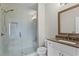 Modern bathroom with a glass shower, marble tile, and a vanity with sleek fixtures and finishes at 215 Arizona Ne Ave # 1, Atlanta, GA 30307