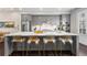 Modern kitchen with gray cabinets, stainless steel appliances, and a large island with seating at 215 Arizona Ne Ave # 1, Atlanta, GA 30307