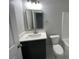 Bathroom featuring a single vanity, toilet, and a combination shower/tub at 229 Evergreen Trail Unit C, Cartersville, GA 30121