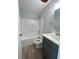 Bright bathroom featuring a tub, toilet, vanity with countertop, and modern fixtures at 229 Evergreen Trail Unit C, Cartersville, GA 30121