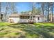 The house features a large yard with a screened in porch, making the space excellent for entertaining at 3435 Stallion Ct, Powder Springs, GA 30127