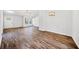Living room featuring hardwood floors, vaulted ceilings, and lots of natural light at 3435 Stallion Ct, Powder Springs, GA 30127