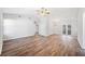 A bright living room featuring hard surface floors and vaulted ceilings at 3435 Stallion Ct, Powder Springs, GA 30127