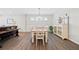 Inviting dining room featuring a dining table, chairs, and a decorative display cabinet at 41 Balsam Dr, Dallas, GA 30157