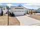 Attractive single-Gathering house featuring an attached garage and green lawn at 41 Balsam Dr, Dallas, GA 30157