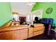 Spacious living room with fireplace and large leather sectional sofa at 70 Trelawney Cir, Covington, GA 30016