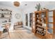 Charming breakfast nook featuring a farmhouse display cabinet and access to the patio at 113 Windsong Trl, Canton, GA 30114