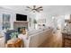 Bright living room featuring a modern fireplace, a comfortable seating area, and neutral color palette at 113 Windsong Trl, Canton, GA 30114