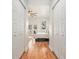 Hallway view into the primary bedroom with access to backyard patio and double closets at 1552 Newton Se Ave, Atlanta, GA 30316