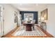 Inviting dining room with hardwood floors, stylish rug, and natural light at 1552 Newton Se Ave, Atlanta, GA 30316