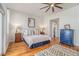 Cozy main bedroom with hardwood floors, ceiling fan, and ample natural light at 1552 Newton Se Ave, Atlanta, GA 30316