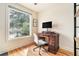 Cozy office space with a desk, chair, and a large window that brings in natural light at 1552 Newton Se Ave, Atlanta, GA 30316