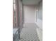 Enclosed balcony with diamond pattern tile floor and metal railing at 3060 Pharr Court North Nw # 306, Atlanta, GA 30305