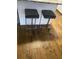 Close-up of two padded bar stools at the kitchen island at 3060 Pharr Court North Nw # 306, Atlanta, GA 30305