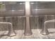 Close-up of a stylish, brushed-nickel faucet with elegant handles on a marble countertop at 3060 Pharr Court North Nw # 306, Atlanta, GA 30305