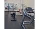 Resident gym featuring treadmills, weight machines, benches and a full mirror at 3060 Pharr Court North Nw # 306, Atlanta, GA 30305