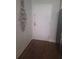 Hallway with hardwood flooring and neutral wall with decorative wall art at 3060 Pharr Court North Nw # 306, Atlanta, GA 30305