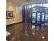 Spacious lobby with shiny terrazzo floors, modern lighting, and views to the exterior at 3060 Pharr Court North Nw # 306, Atlanta, GA 30305