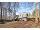 Backyard view with trampoline at 3747 Junior Ln, Douglasville, GA 30135