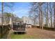 Backyard with trampoline and privacy fence at 3747 Junior Ln, Douglasville, GA 30135