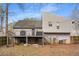Backyard view of home, deck, and fenced yard at 3747 Junior Ln, Douglasville, GA 30135