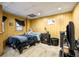 Bedroom with a bed, wood paneling, and carpet at 3747 Junior Ln, Douglasville, GA 30135