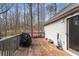 Wooden deck with grill and sliding door to house at 3747 Junior Ln, Douglasville, GA 30135