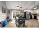 Dining area features a sliding glass door to the backyard and connects to the kitchen at 3747 Junior Ln, Douglasville, GA 30135