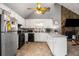 Well-lit kitchen with functional layout open to the Gathering room at 3747 Junior Ln, Douglasville, GA 30135