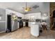 Bright kitchen features white cabinets and appliances at 3747 Junior Ln, Douglasville, GA 30135