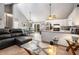 Open layout shows living room with a dining area and a peek into the kitchen at 3747 Junior Ln, Douglasville, GA 30135