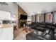 Open-concept living room features a stone fireplace and connects to the kitchen at 3747 Junior Ln, Douglasville, GA 30135