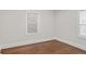 Bedroom with hardwood floors, fresh paint, and natural light at 1132 Fair St, Atlanta, GA 30314