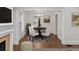 Formal dining room area with hardwood floors and decorative rug at 1132 Fair St, Atlanta, GA 30314