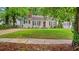Charming one-story home with a well-maintained lawn and traditional architectural details at 1132 Fair St, Atlanta, GA 30314