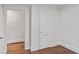 Hallway with hardwood floors and white doors at 1132 Fair St, Atlanta, GA 30314