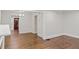 Bright and airy living area with hardwood floors and a doorway leading to other rooms at 1132 Fair St, Atlanta, GA 30314