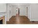 Spacious living room featuring hardwood floors, white trim, and an open floor plan at 1132 Fair St, Atlanta, GA 30314