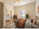 Cozy bedroom featuring neutral tones, stylish furniture, and a ceiling fan for added comfort at 480 James P Brawley Nw Dr, Atlanta, GA 30318