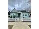 Charming bungalow with a well-maintained yard and a classic white picket fence offers great curb appeal at 480 James P Brawley Nw Dr, Atlanta, GA 30318